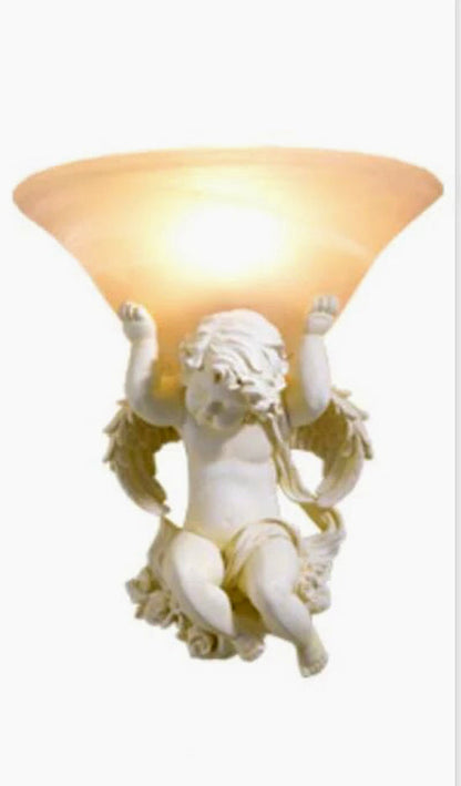 ALDO Lighting > Lighting Fixtures > Ceiling Light Fixtures Left 30cm x height 33cm. / 12" x 12.9" inches / white / resin and glass Angels Statue Sculptural Electric Wall LED 3 Colors Lamp Sconce