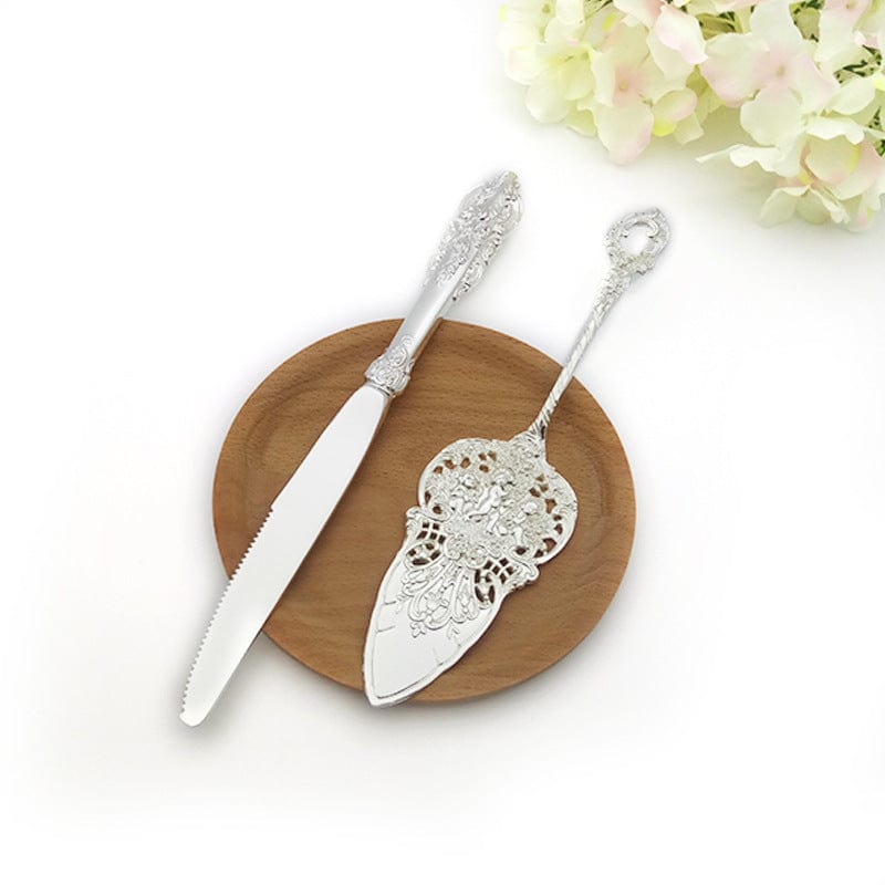 ALDO Party & Celebration > Party Supplies > Party Favors > Wedding Favors New / Stainless steel / Cake Knife cutter: 9.25 inch/ 23.5 cm      Cake shovel: 8 inch/ 20.5 cm Beutiful Laxury Bride and Groom British Court Silver-Plated  Cake Knife and Cake Shovel Set