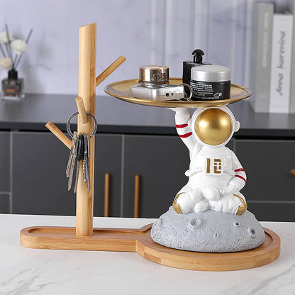 ALDO Tables > Accent Tables 10.5" H.  x 13.6" L  x 7 " W / new / resin Astronaut Apollo 11 Butler Seating on the Moon Sculptural Statue with Metal Tray and Wood Shelf