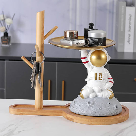 ALDO Tables > Accent Tables 10.5" H.  x 13.6" L  x 7 " W / new / resin Astronaut Apollo 11 Butler Seating on the Moon Sculptural Statue with Metal Tray and Wood Shelf
