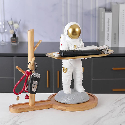 ALDO Tables > Accent Tables 10.5" H.  x 13.6" L  x 7 " W / new / resin Astronaut Apollo 11 Butler Standing on the Moon Sculptural Statue with Metal Tray and Wood Shelf